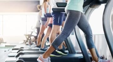 people on treadmill in sport center